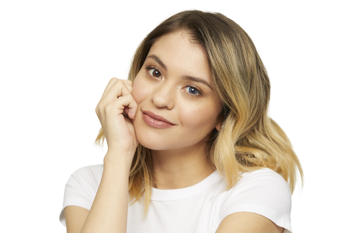 woman with shoulder-length blonde hair and white t-shirt wearing Air Optix Colors color contact lenses in the color, Blue