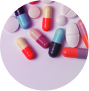 Colorful medication capsules set on a light background