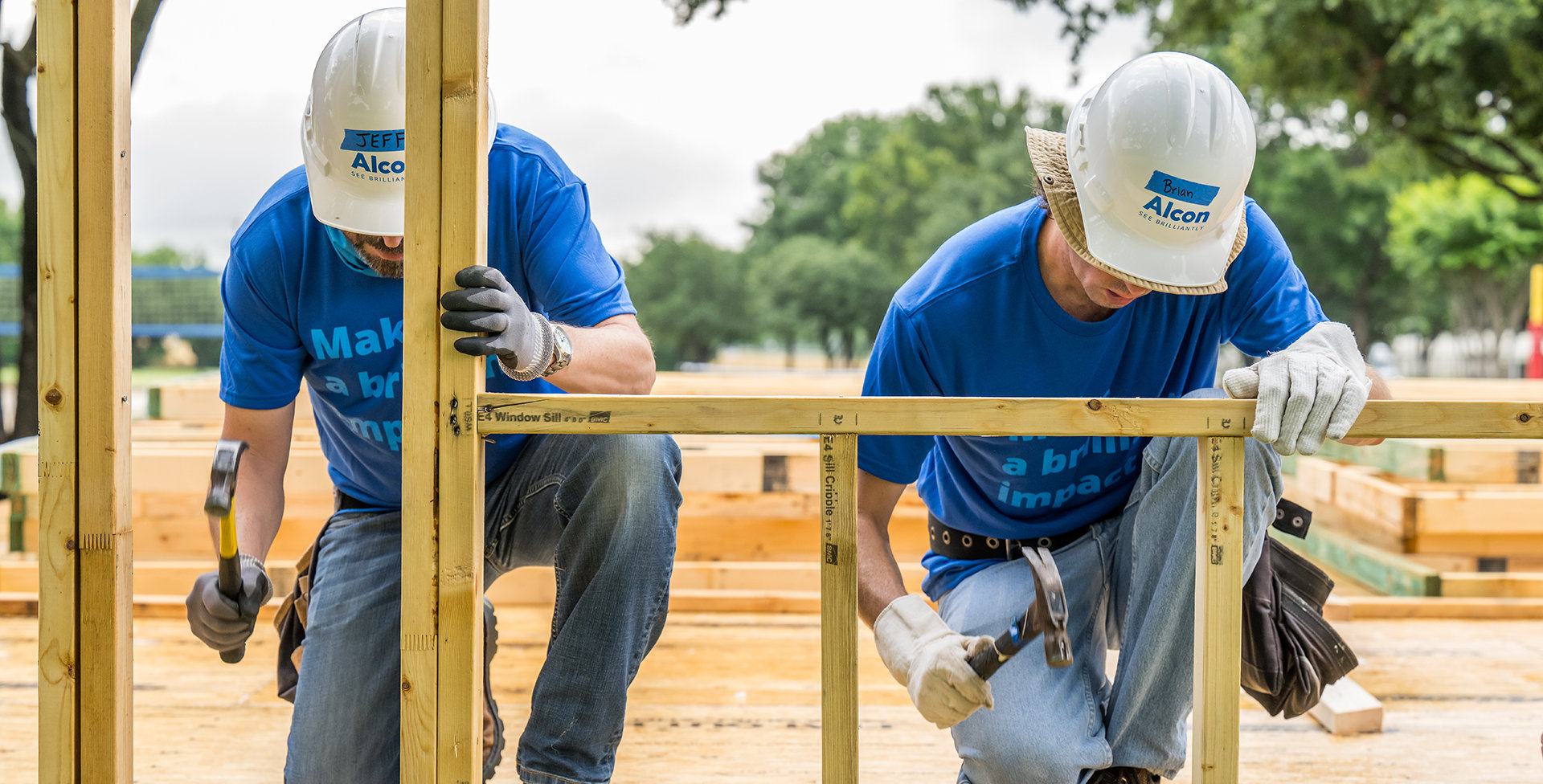 Alcon volunteers building a home