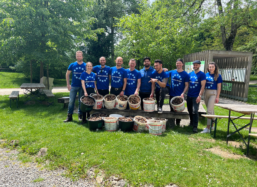 Employees showing off their harvest