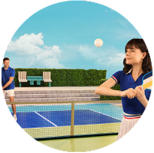 Woman looking at her computer screen with a focused expression